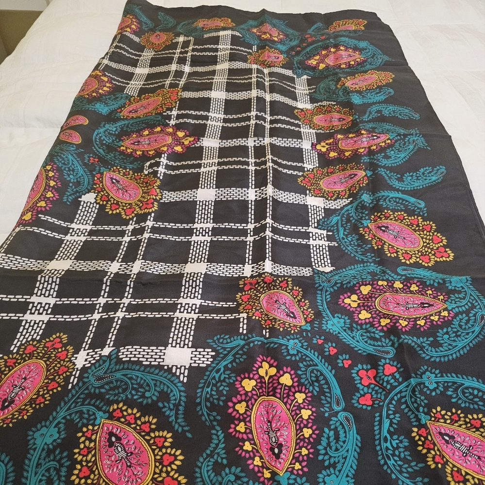 Diane von Furstenberg  100%silk scarf multicolor predominant color black.